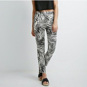 Forever 21 palm leaf print white high waisted pants.